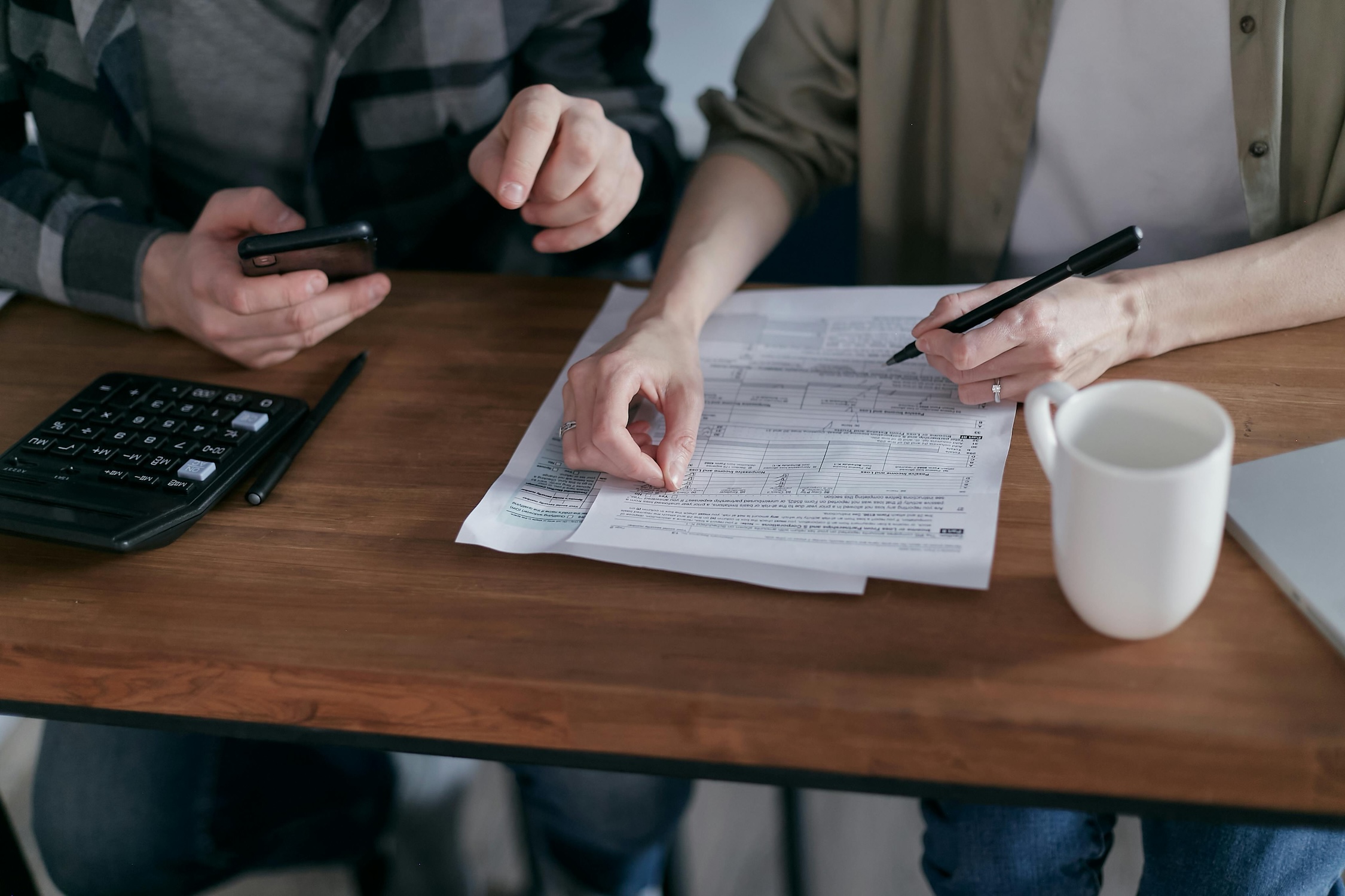 a couple working on taxes