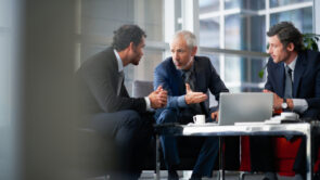 Mature business people discussing business strategy