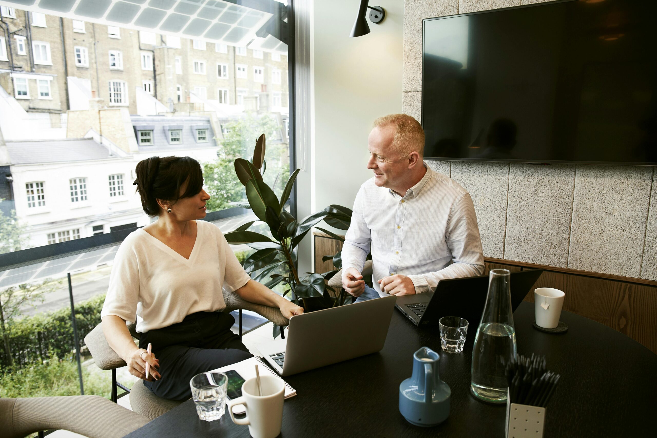 A man and a woman in a business meeting