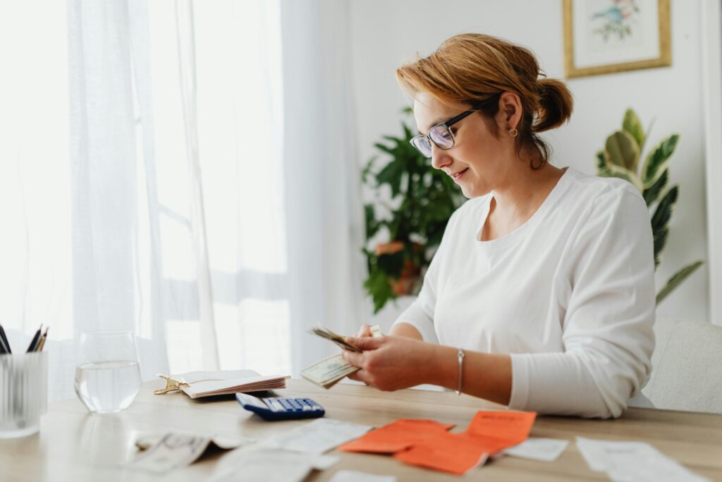 A woman counting expenses