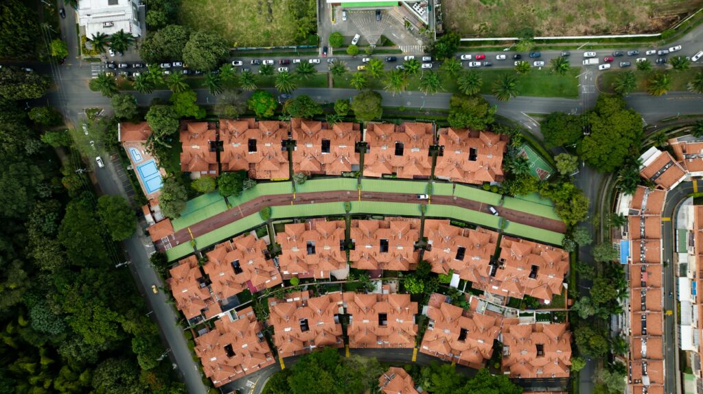 Aerial view of a new building complex—reflecting how enhanced Opportunity Zone benefits under the OBBB may drive new housing and infrastructure investments in underserved communities.