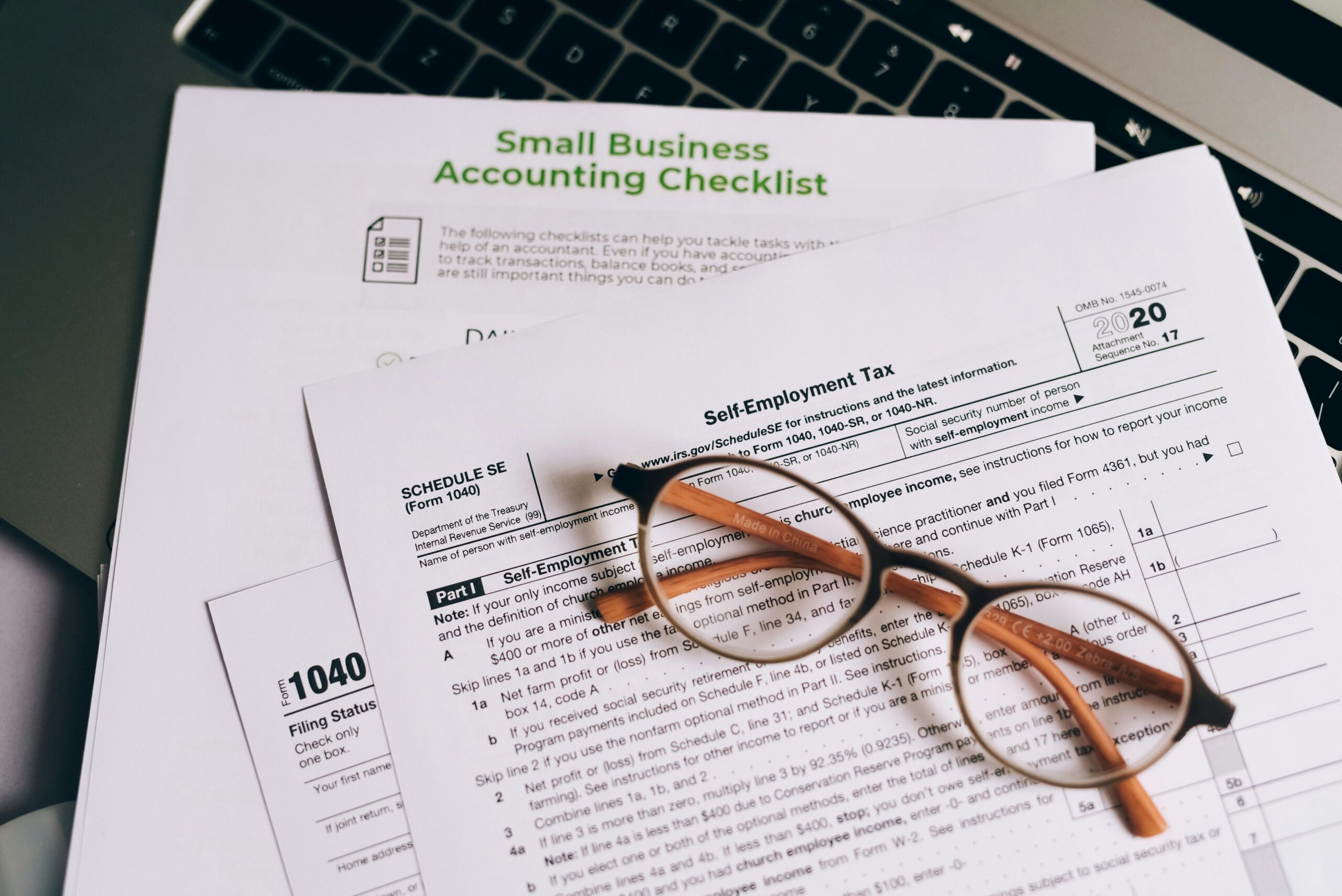 Image of glasses on top of tax filing documents