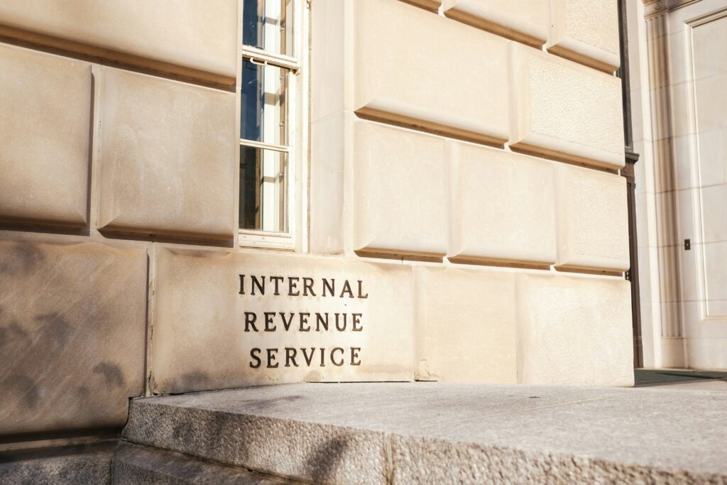 A close-up view of an IRS building, representing the evolving landscape of tax enforcement and compliance in the era of AI audits by the IRS.