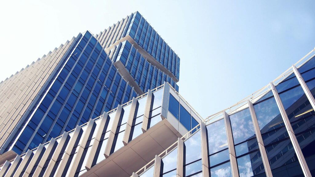 Image of a glass business building.